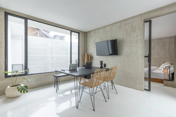black flat screen tv on brown wooden table